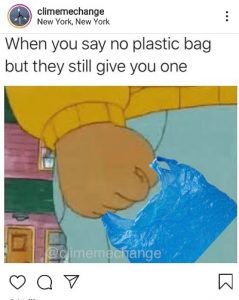 A climate-themed meme based on a cartoon hand, onto which a plastic bag has been photoshopped afterwards. The cartoon hand's fist is clenched tightly around the plastic bag handle. The text above reads "When you say no plastic bag but they still give you one."